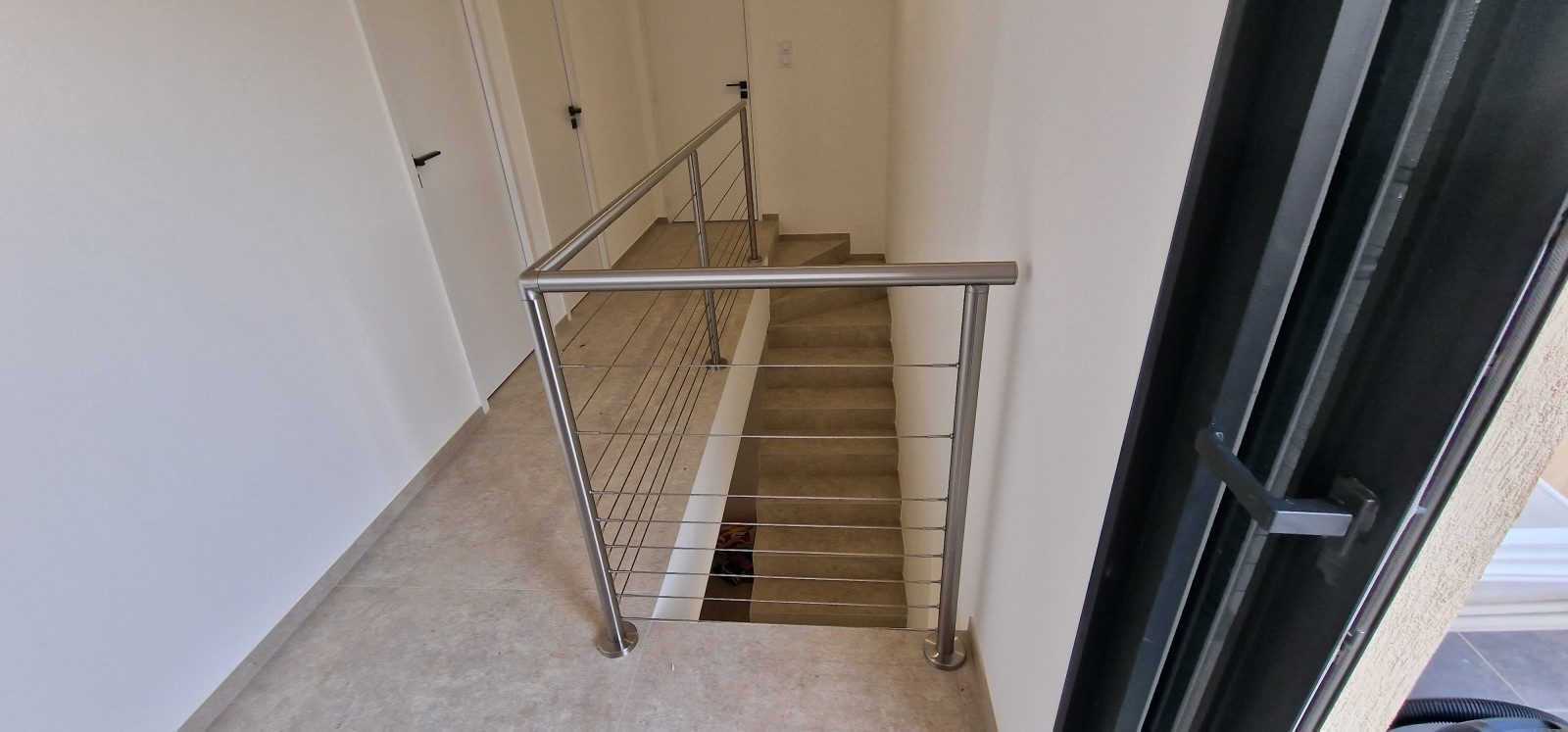 Installation d'un garde-corps en inox brossé et câbles à Toulon avec SHM